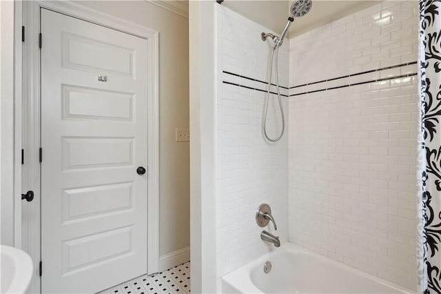 bathroom with shower / bathtub combination with curtain