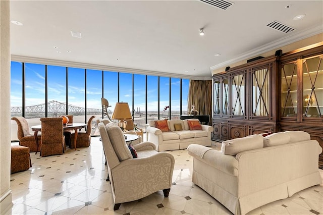 living room with ornamental molding, a wealth of natural light, and a wall of windows