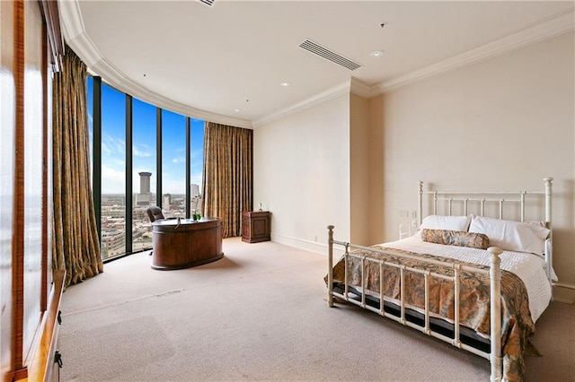 bedroom featuring access to outside, floor to ceiling windows, ornamental molding, and carpet