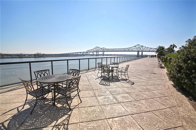 view of patio / terrace with a water view