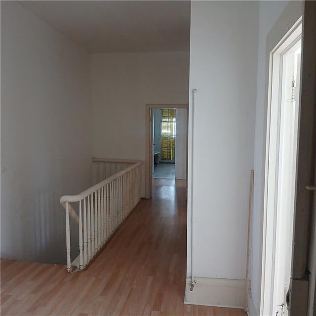1322 Kerlerec St, New Orleans, LA 70116 - hallway with an upstairs landing and wood finished floors