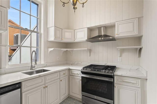 kitchen featuring white cabinets, sink, wall chimney exhaust hood, light stone countertops, and stainless steel appliances