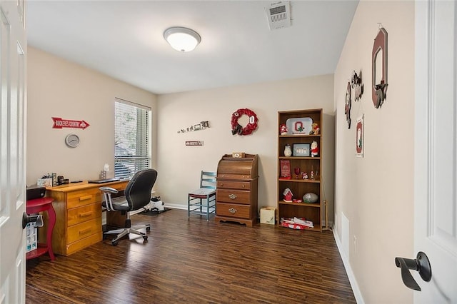 office space with dark wood-type flooring