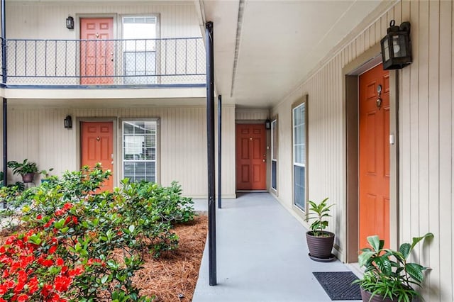 entrance to property with a balcony