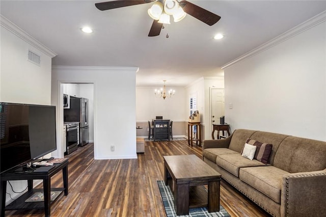 living room with ceiling fan with notable chandelier, dark hardwood / wood-style flooring, and ornamental molding