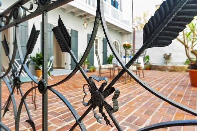 view of patio with a balcony