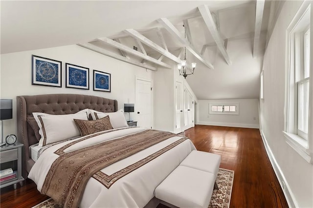 bedroom featuring vaulted ceiling with beams, a chandelier, and dark hardwood / wood-style floors