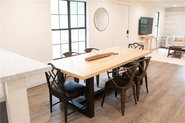 dining room with light wood-type flooring