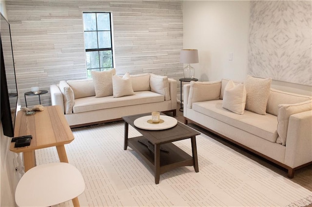 living room featuring tile walls