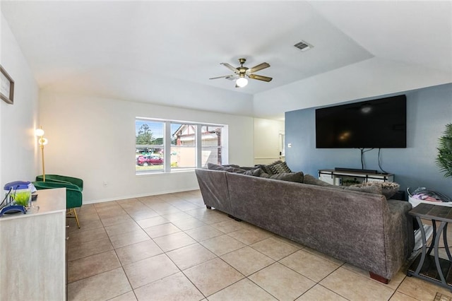 living room with ceiling fan and light tile floors