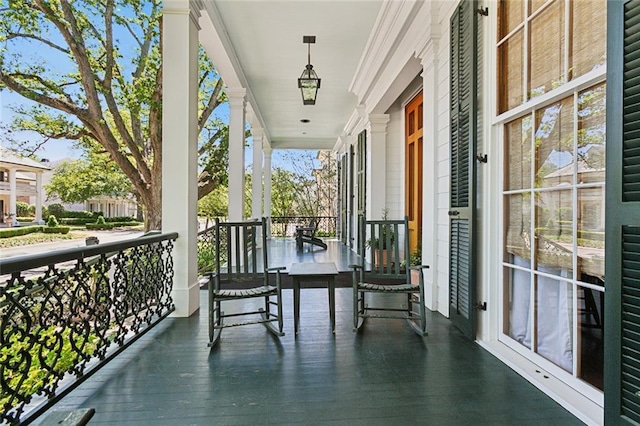 balcony featuring covered porch