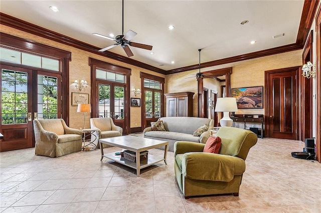 tiled living room with ceiling fan, a healthy amount of sunlight, crown molding, and french doors