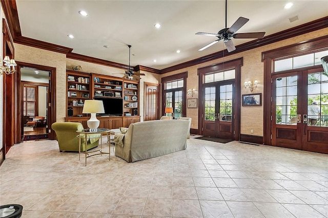 tiled living room featuring built in features, ceiling fan, french doors, and ornamental molding