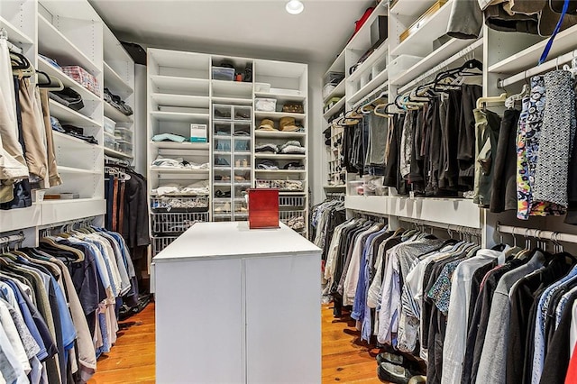 spacious closet featuring light wood-type flooring