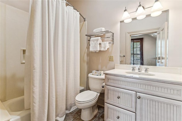 full bathroom featuring oversized vanity, tile flooring, shower / bath combo with shower curtain, and toilet