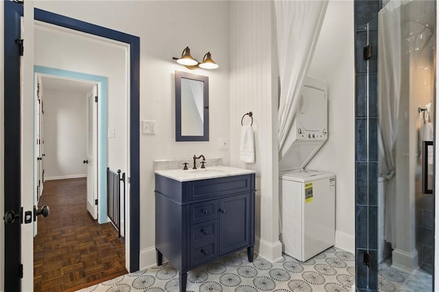 bathroom with a shower with shower curtain, vanity, and parquet floors