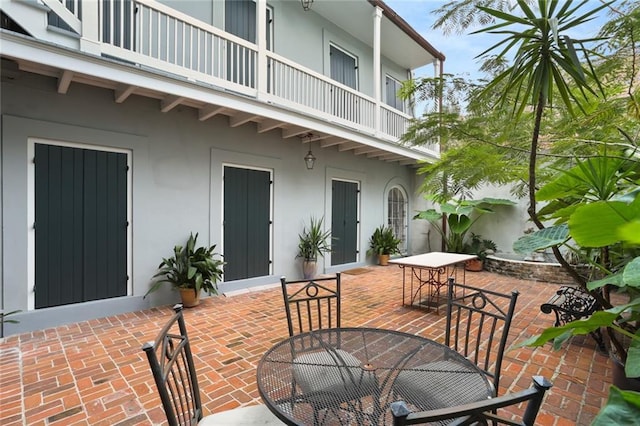 view of patio / terrace featuring a balcony