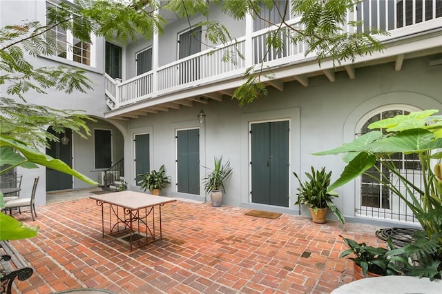 view of patio / terrace featuring a balcony