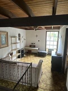 living room with beamed ceiling and wood ceiling