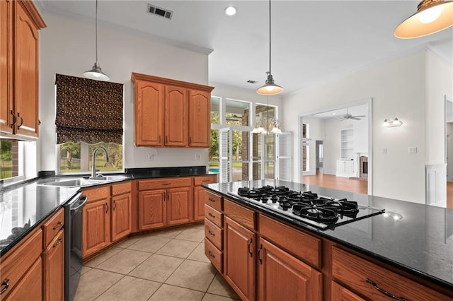 kitchen featuring visible vents, a sink, black gas cooktop, dishwasher, and crown molding