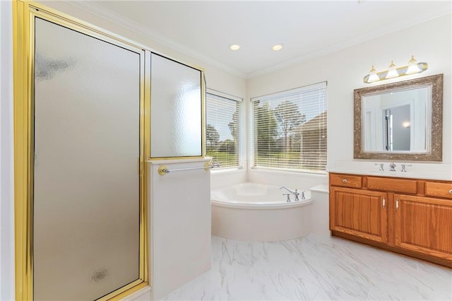 bathroom with vanity, ornamental molding, a shower stall, a garden tub, and marble finish floor