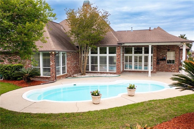 pool with a patio