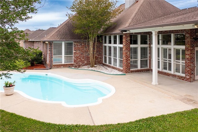 outdoor pool with a patio