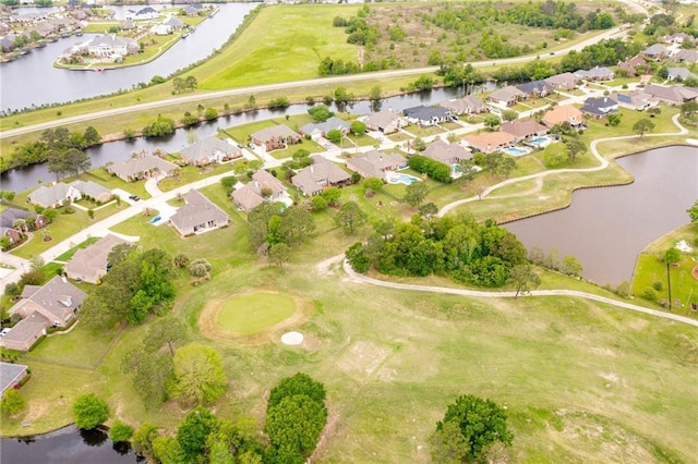 bird's eye view featuring a residential view and a water view