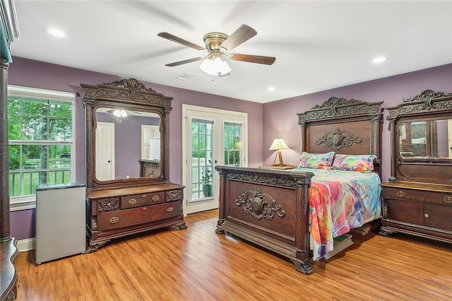 empty room with hardwood / wood-style flooring and ceiling fan