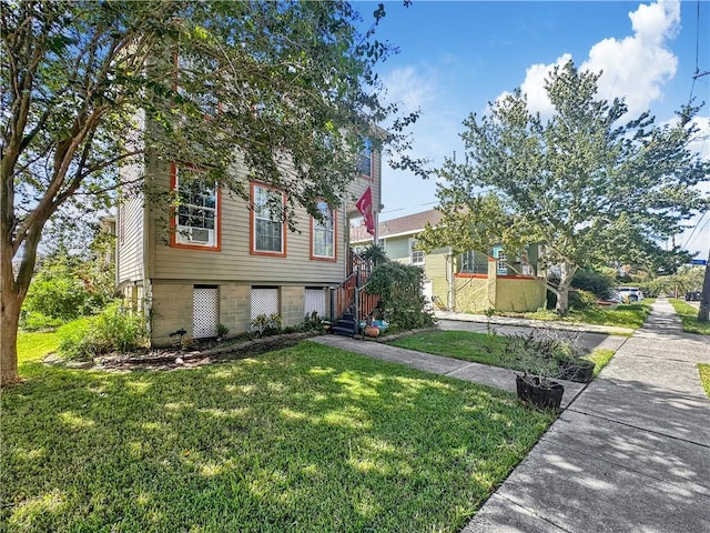 view of front facade featuring a front yard