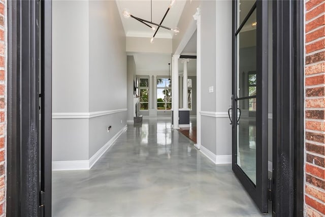entrance foyer with a chandelier