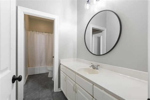 full bathroom featuring tile flooring, large vanity, toilet, and shower / tub combo with curtain