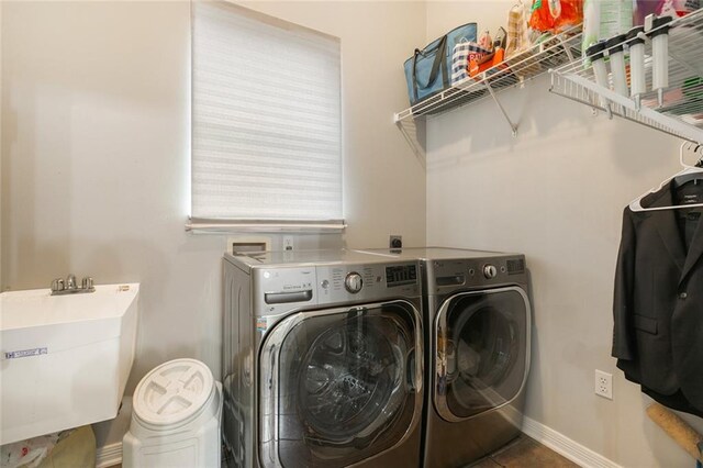 laundry room featuring sink, washer and dryer, washer hookup, and electric dryer hookup