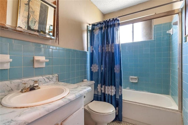 full bathroom featuring vanity with extensive cabinet space, shower / tub combo, tile walls, tasteful backsplash, and toilet