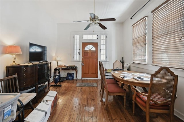 dining space featuring ceiling fan and hardwood / wood-style flooring