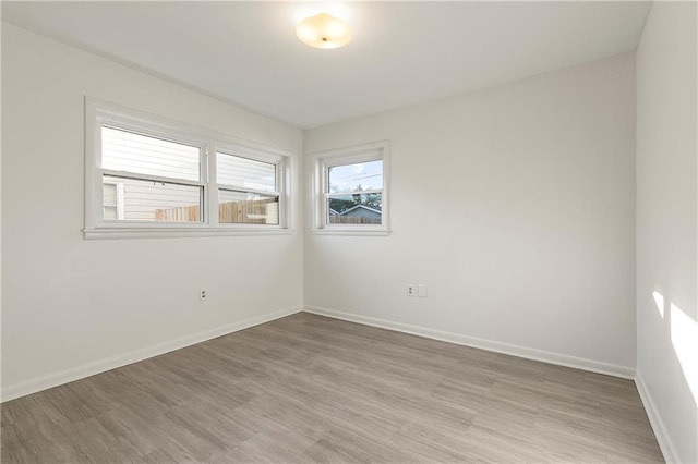 empty room featuring hardwood / wood-style floors