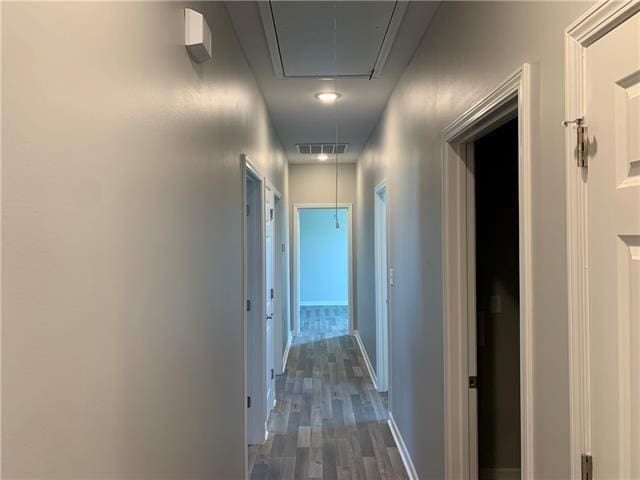 hall featuring dark hardwood / wood-style floors