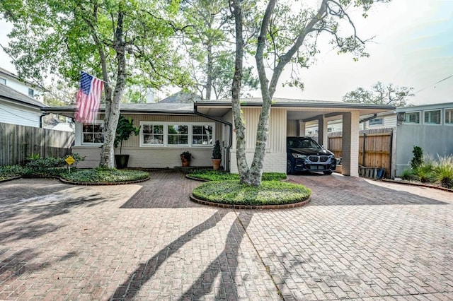 view of front facade with a carport