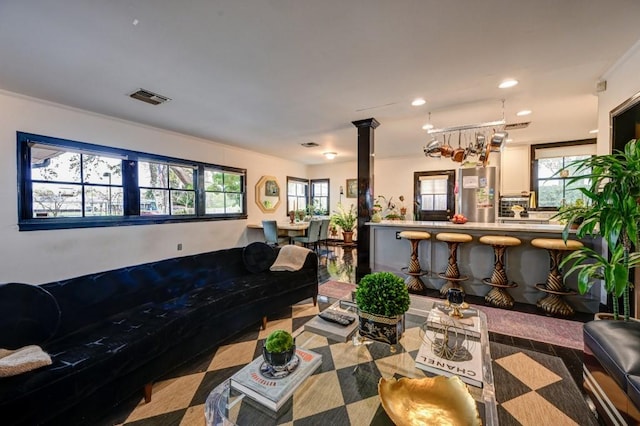 living room featuring ornamental molding