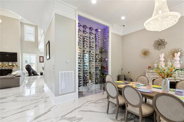 dining room featuring a notable chandelier and crown molding