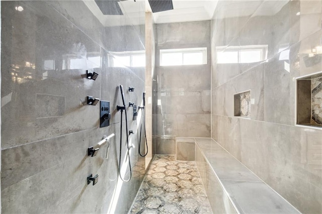 bathroom featuring tiled shower