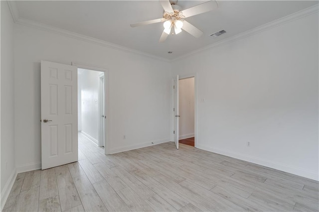 unfurnished room featuring ceiling fan, light hardwood / wood-style floors, and crown molding