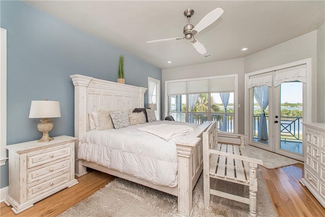 bedroom featuring access to outside, ceiling fan, and hardwood / wood-style floors