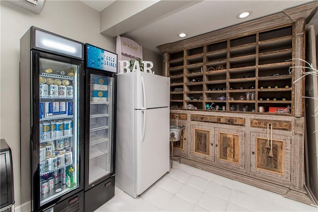 wine cellar featuring light tile floors