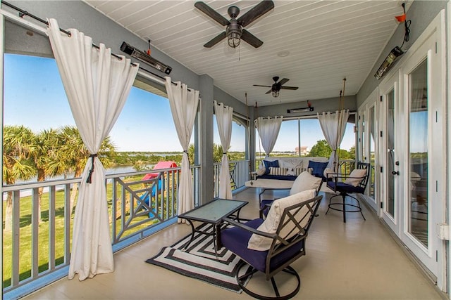 view of patio with outdoor lounge area and ceiling fan