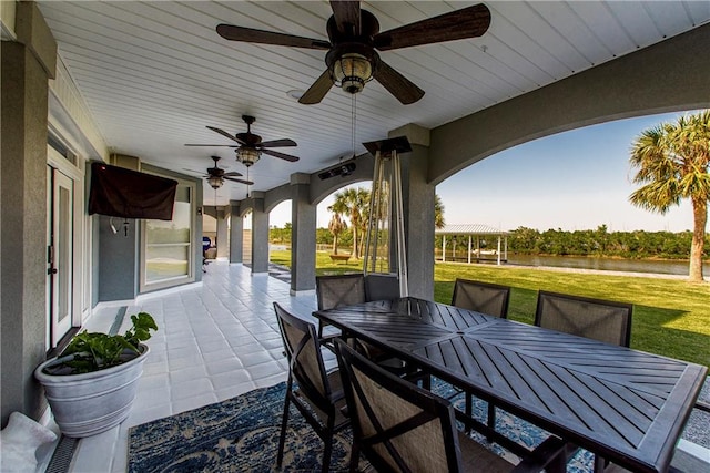 view of patio featuring ceiling fan