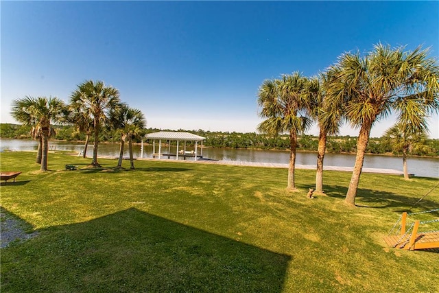 view of yard featuring a water view and a gazebo