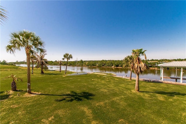 exterior space with a gazebo and a water view