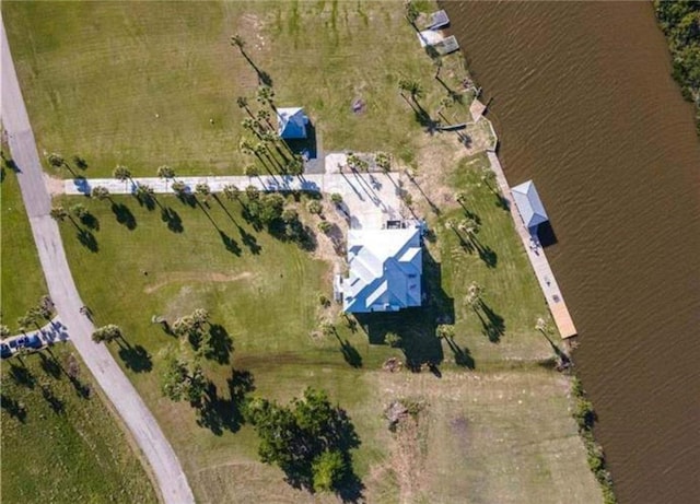 aerial view with a water view and a rural view