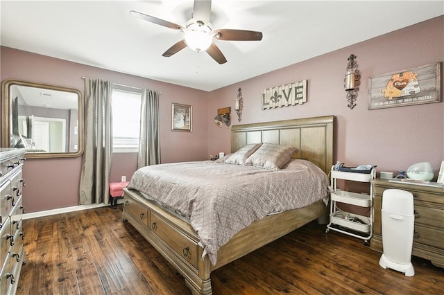 bedroom with dark wood-type flooring and ceiling fan